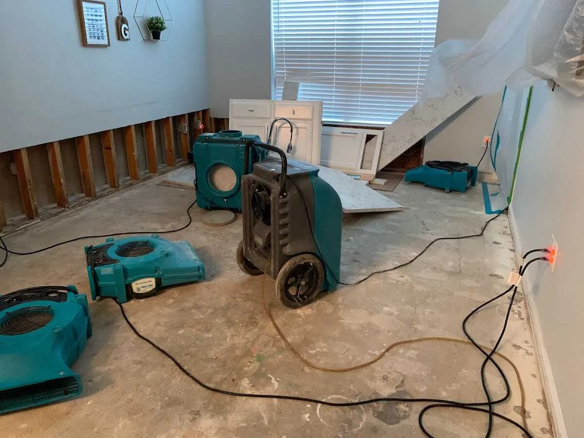 Dehumidifier in flood-cut room for Water Damage Restoration in Decorah